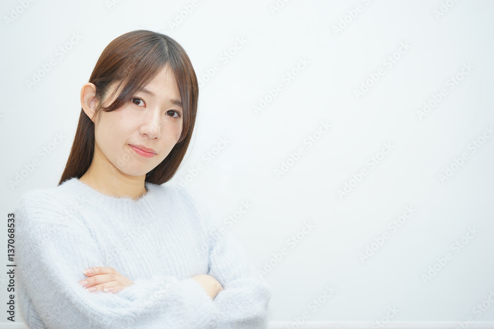 Young woman thinking something with white background Young woman thinking something with white background