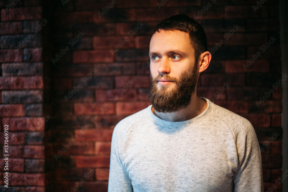 Fototapeta premium Man with a beard looking ahead