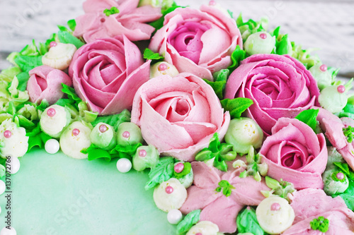 Birthday cake with flowers rose on white background