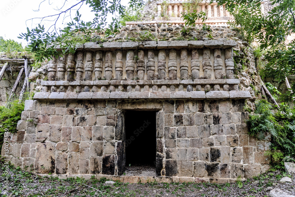 sight of a vaulted room, in ruins, of the big Mayan palace in the archaeological Sayil enclosure in Yucatan, Mexico sight of a vaulted room, in ruins, of the big Mayan palace in the archaeological Sayil enclosure in Yucatan, Mexico