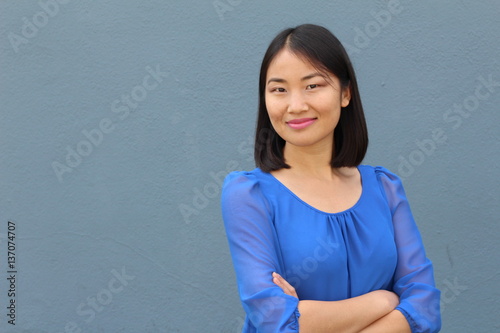 Determined looking Asian working woman 