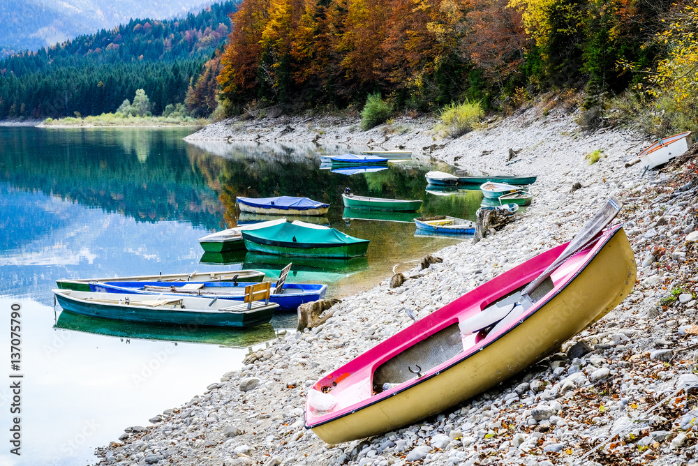 row boats at the sylvensteinspeicher lake in germany