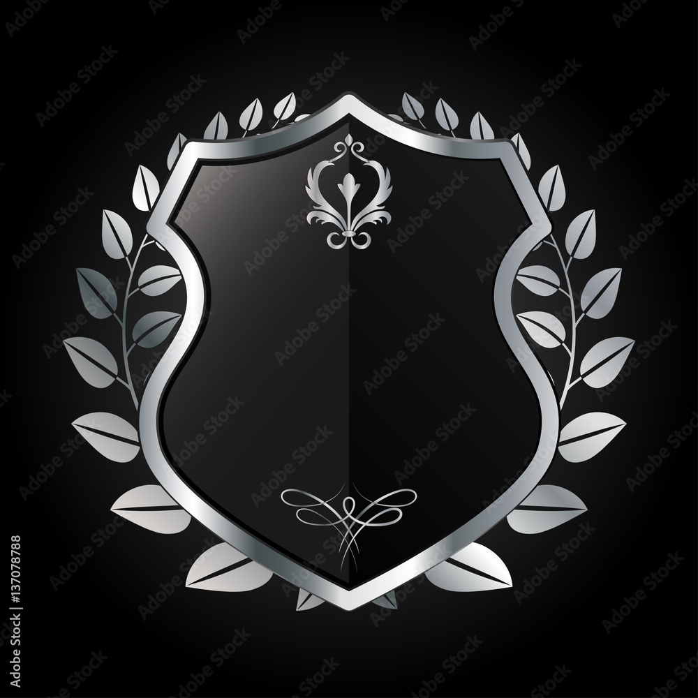 vector illustration of black and silver heraldic shield with metal laurel wreath - symbol for security and protection vector illustration of black and silver heraldic shield with metal laurel wreath - symbol for security and protection
