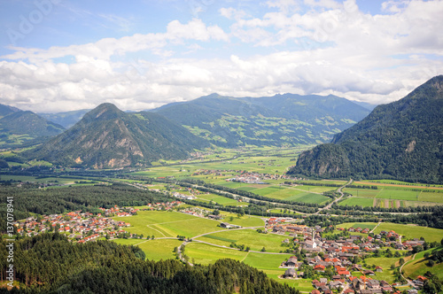 View into the zillertal valley with its villages and meadows in