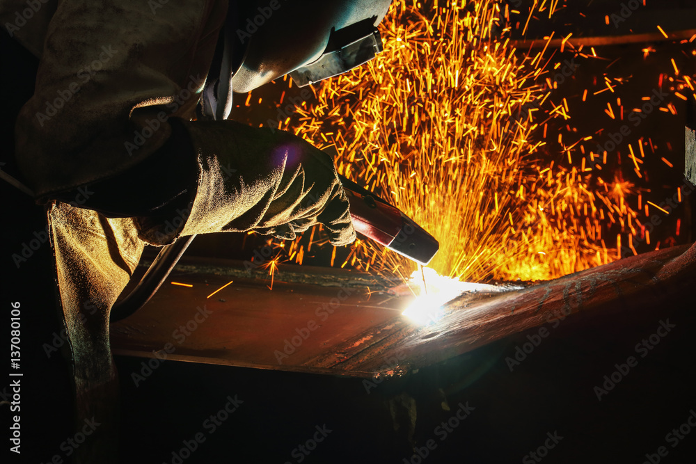 Welder arc Gouging carbon electrode rods   with sparks and smoke