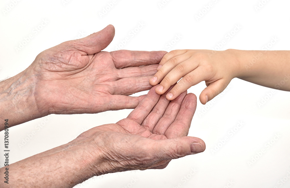 Hands of old man and child Hands of old man and child