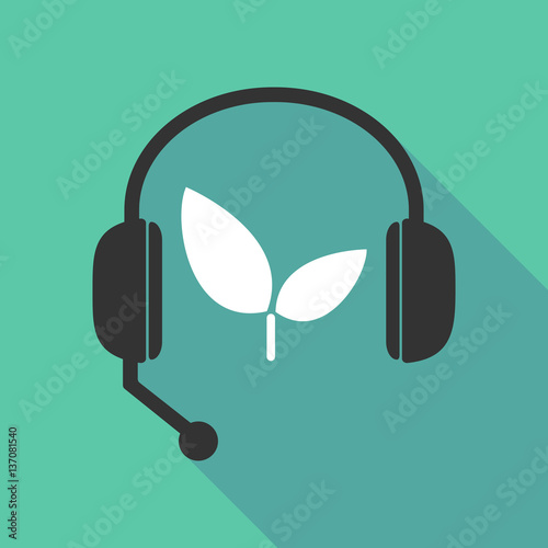 Long shadow headphones with a plant