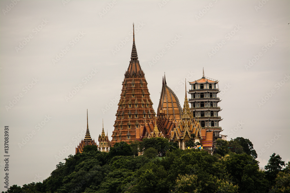 Fototapeta premium THAM SUEA Temple Buddha Images architectural style by Chinese arts located Kanchanaburi province Thailand 