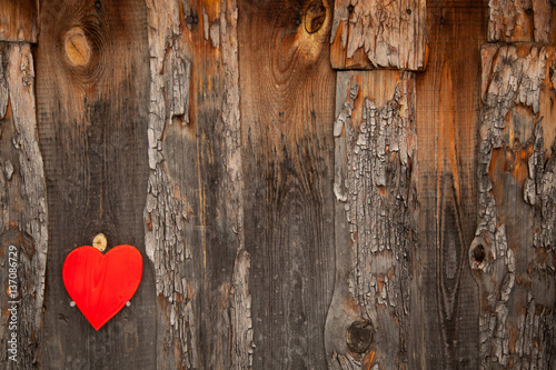 Red heart on a rustic wooden background. St. Valentine's Day