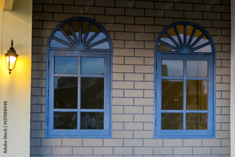 Obraz premium two big windows on the wall decorate with lantern, luxury style