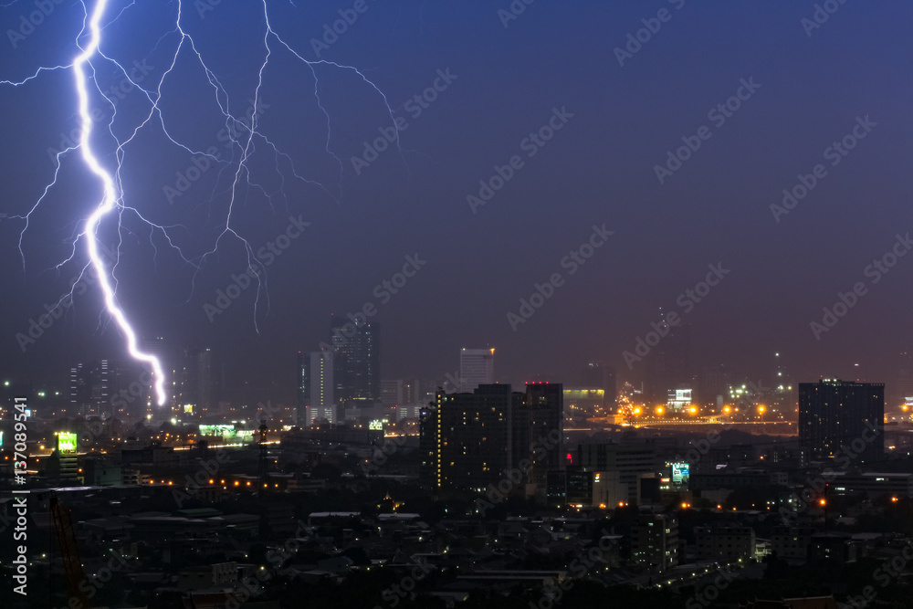 Dramatic thunder storm lightning bolt on the horizontal sky and city scape