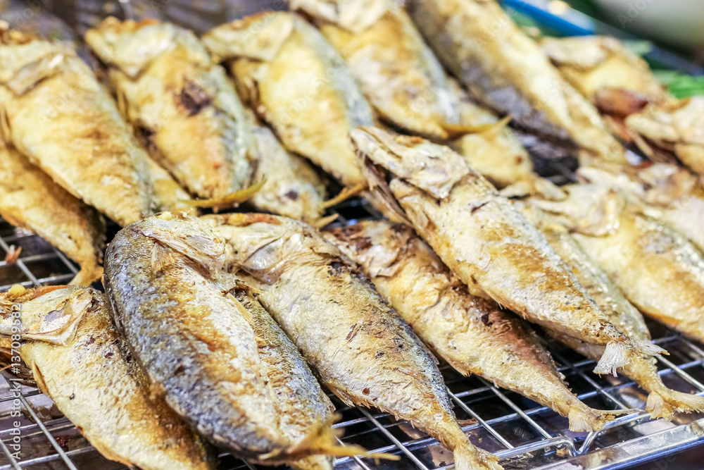 Thai fried mackerel for sell in the floating market Thai fried mackerel for sell in the floating market