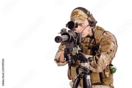 Portrait soldier or private military contractor holding sniper rifle. © kaninstudio