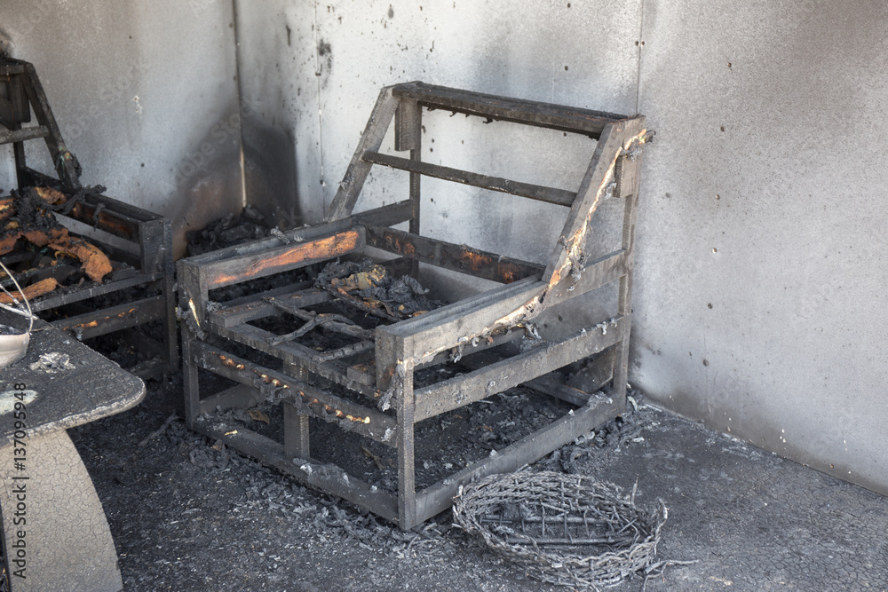 chair and furniture in room after burned by fire in burn scene