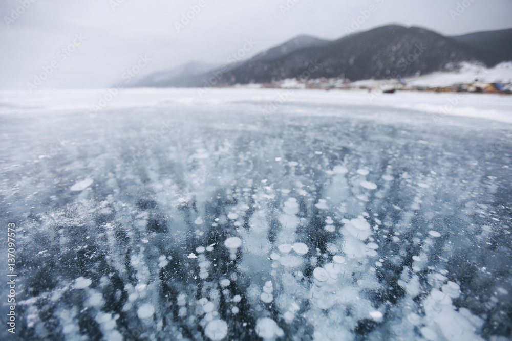 bubbles in ice. Baikal lake. Winter landscape