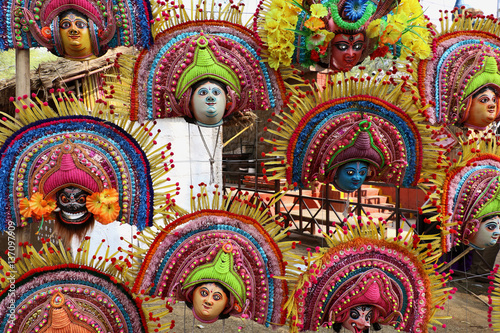 Attractive mask of god and goddess  dancers wear masks, bright costumes and dance on particular occasion. © mds0