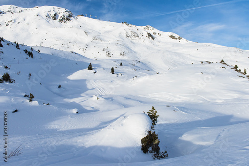 Panoramic view of an alpine snowy mountain