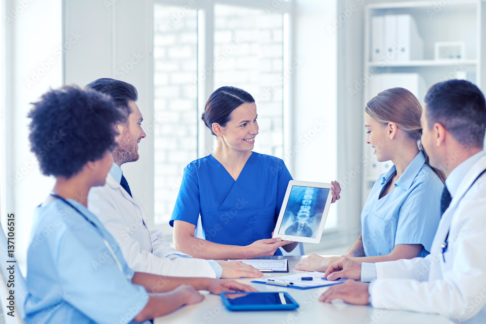 group of happy doctors meeting at hospital office group of happy doctors meeting at hospital office