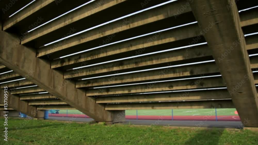 View from under concrete bleachers. View from under concrete bleachers.