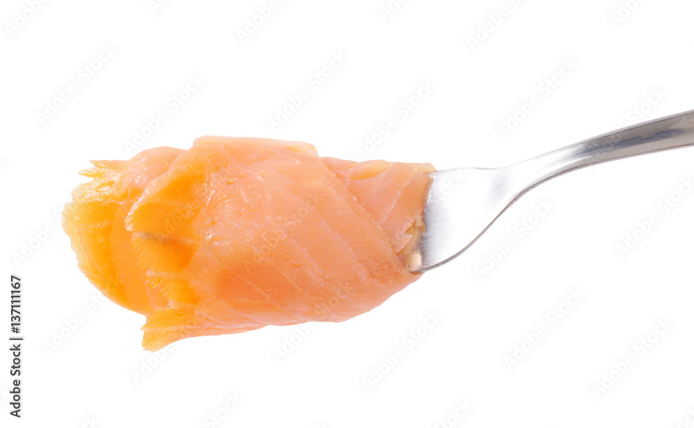 Smoked salmon slice on fork