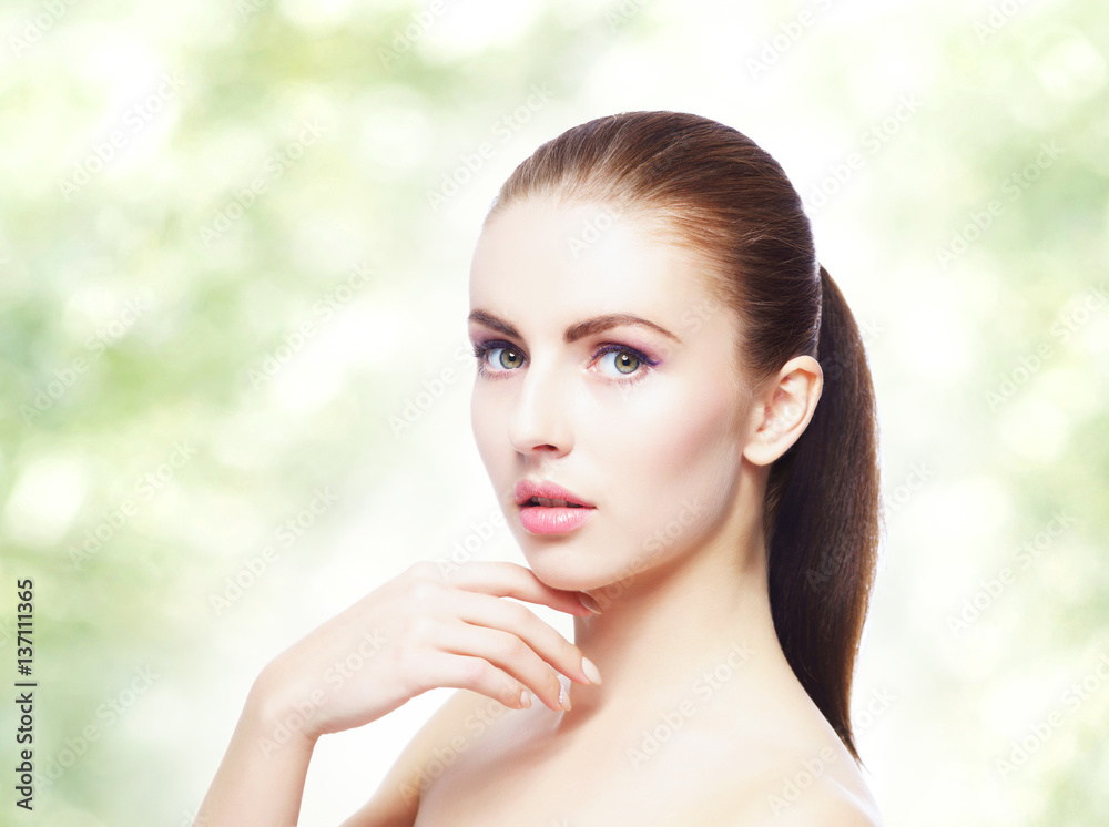 Portrait of young, beautiful and healthy woman: over greenish summer background. Healthcare, spa, makeup and face lifting concept. Portrait of young, beautiful and healthy woman: over greenish summer background. Healthcare, spa, makeup and face lifting concept.