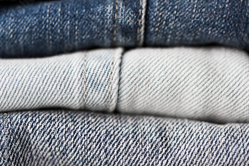close up of denim clothes or jeans pile