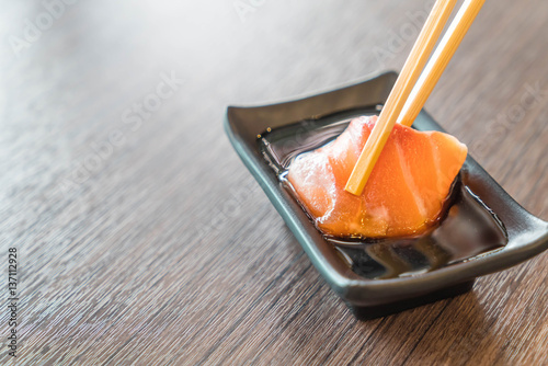 salmon sashimi with soy sauce