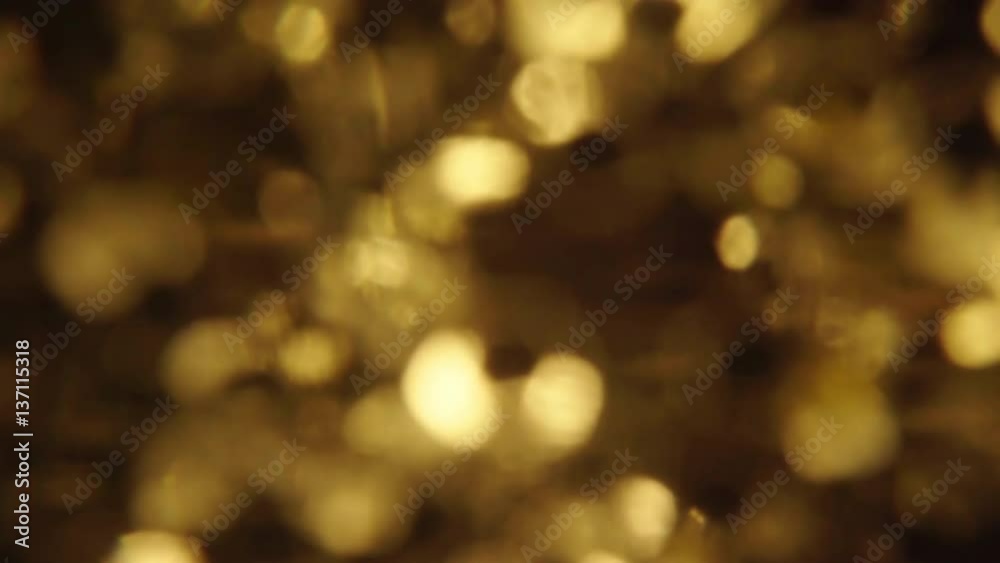 gold sparkle background with optical blurred effect - medium gold sparkle background with optical blurred effect - medium