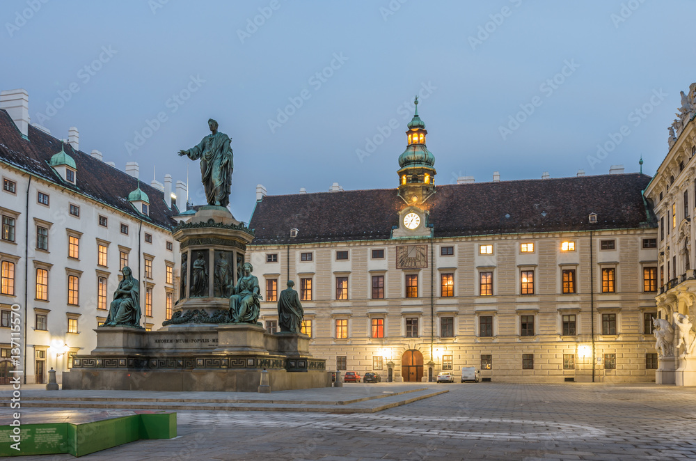 Vienna, Austria, Hofburg imperial palace (old castle) with Emperor Francis I statue in the night