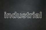 Industry concept: Industrial on chalkboard background