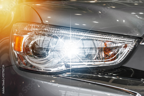 Tablou pe pânză Closeup on an headlight of a sport car
