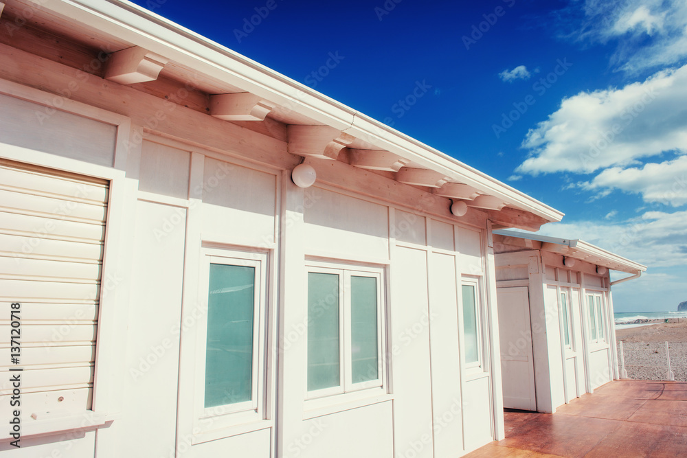 White wooden house in the summer. Sicily, Italy, Europe. White wooden house in the summer. Sicily, Italy, Europe.