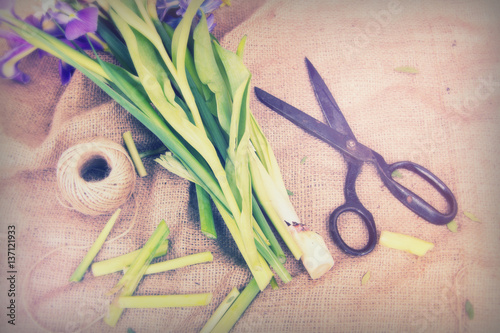 Spring flower arrangement against a rustic background