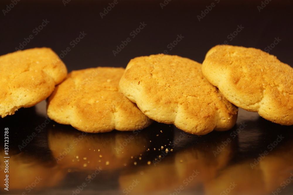 sweet corn cookies isolated on a dark background sweet corn cookies isolated on a dark background
