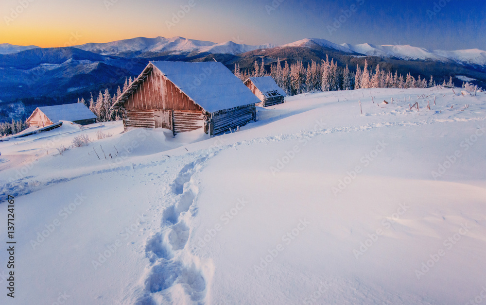 chalets in the mountains at sunset. Carpathian, Ukraine, Europe