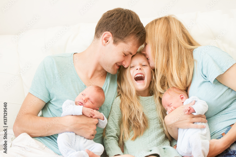 big family of 5 with older daughter and baby twins, indoor portrait at home