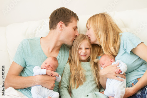 big family of 5 with older daughter and baby twins, indoor portrait at home