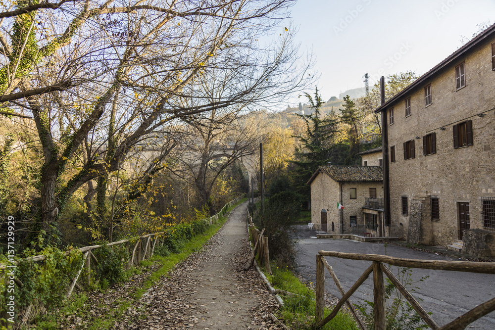 Street view between city and forest in Ascoli Piceno, Italy