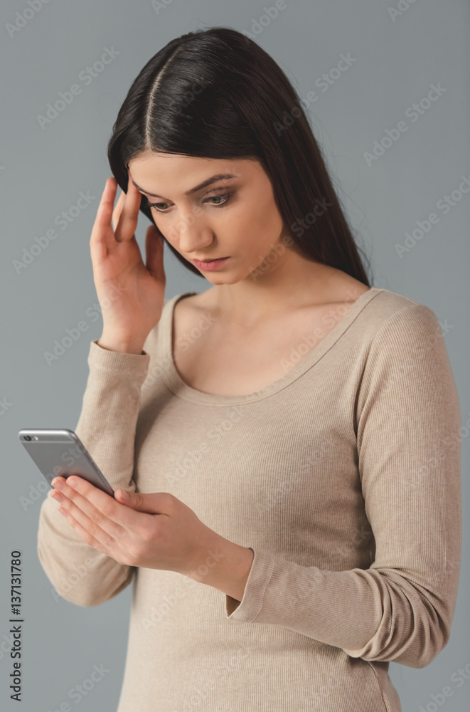 Attractive young woman with gadget Attractive young woman with gadget
