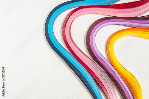 Bright multi-colored strips for quilling
