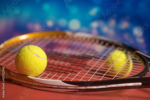 Tennis Balls and Racket on a  Outdoor Court © nvcstudio