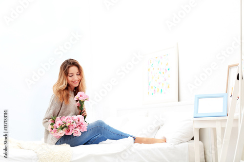 Happy young woman with beau...