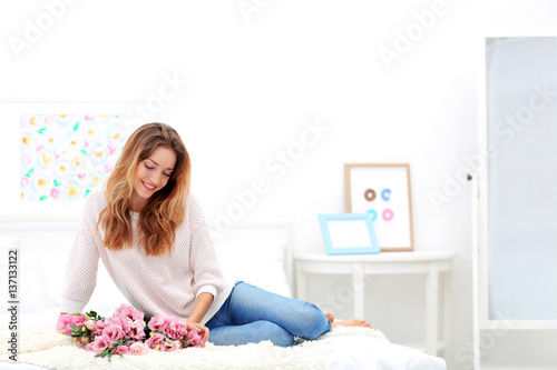 Happy young woman with beau...