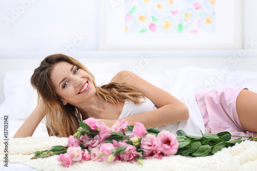 Young cheerful woman with b...