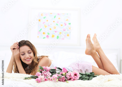 Young cheerful woman with b...