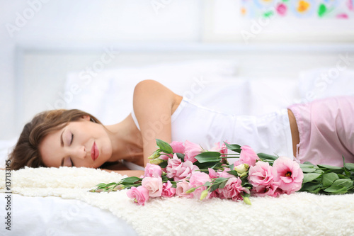 Young cheerful woman with b...