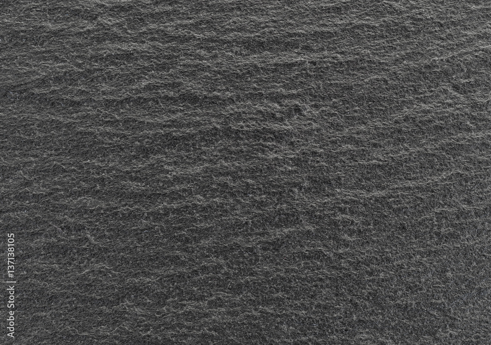 Black slate table top close view.