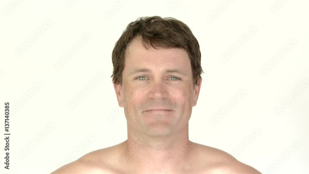 Model released man in studio looking at camera with various positive and happy reactions. Model released man in studio looking at camera with various positive and happy reactions.
