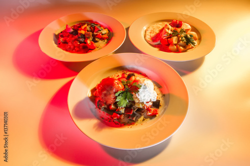 Three different dishes on t...