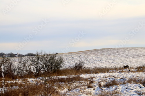 Snowy hill in the countryside in February
